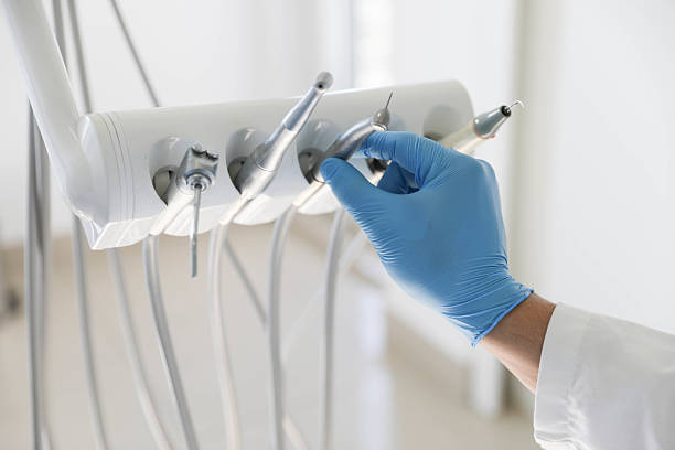 Professional Tooth Extraction technician working in Justin, TX